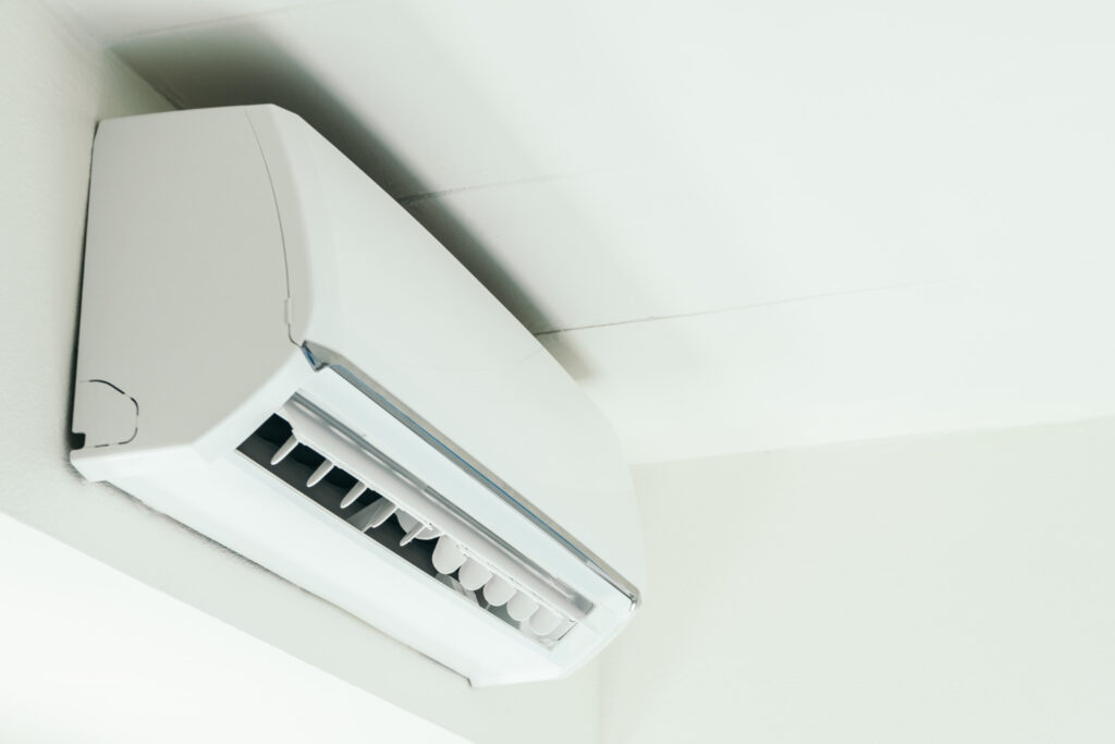 White Air Conditioner Mounted on a wall.